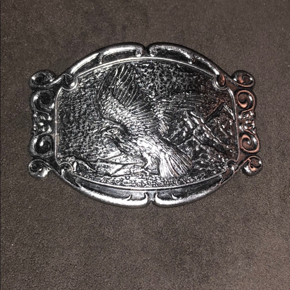 Silver belt buckle